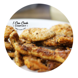 chicken fingers on a white plate